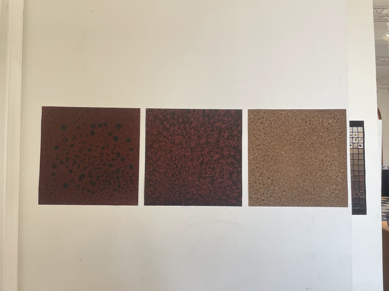 Large-format prints of individual tile scans.