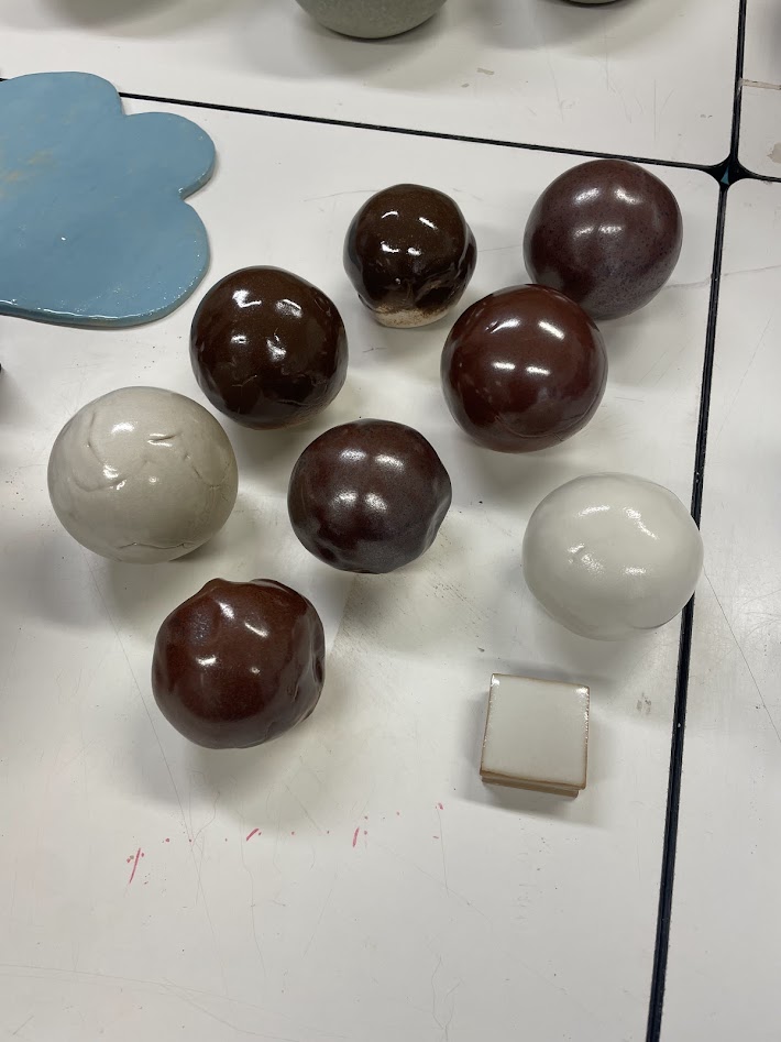Glazed and fired spheres.