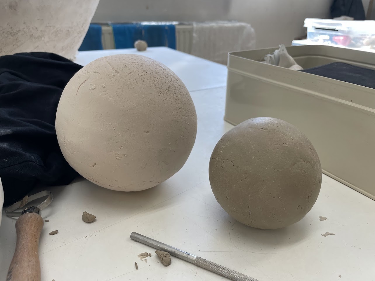 Unglazed test spheres, made by press molding.